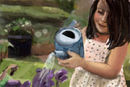 girl-watering-flowers